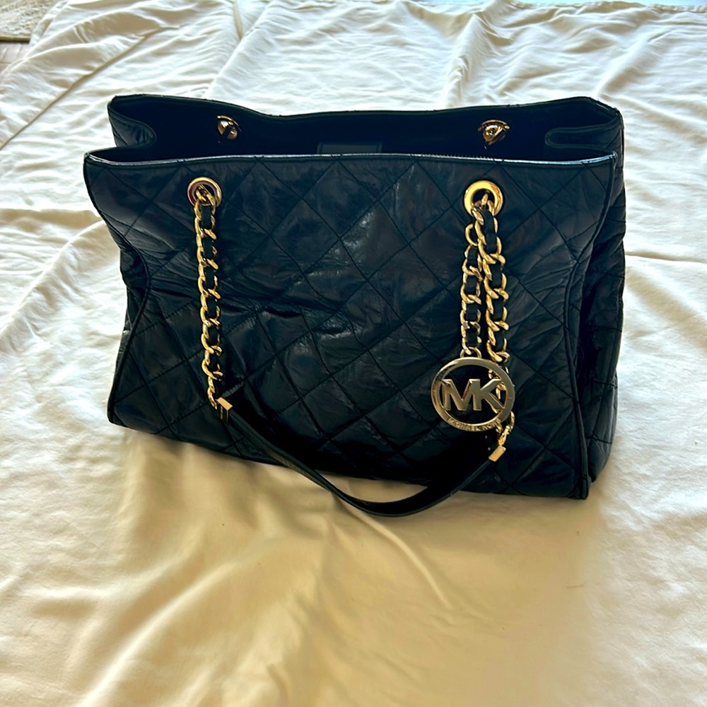 Michael Kors quilted black bag with gold accents